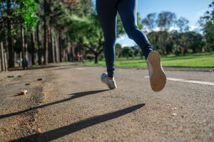 Person Running on pavement